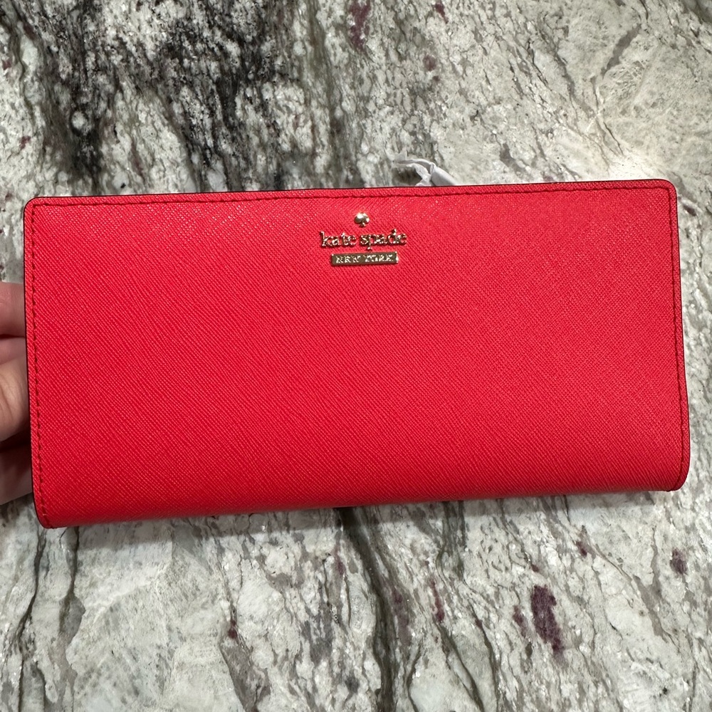 Brand new red Kate Spade slim bifold wallet